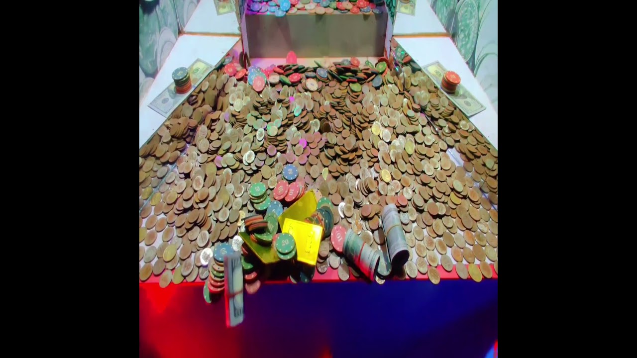 ROLL OF DOLLARS AND CASINO CHIPS CRASHES INSIDE HIGH LIMIT COIN PUSHER